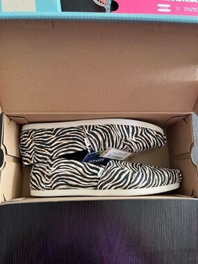 TOMS Zebra-Pattern Slip-On Shoes in Black and Cream